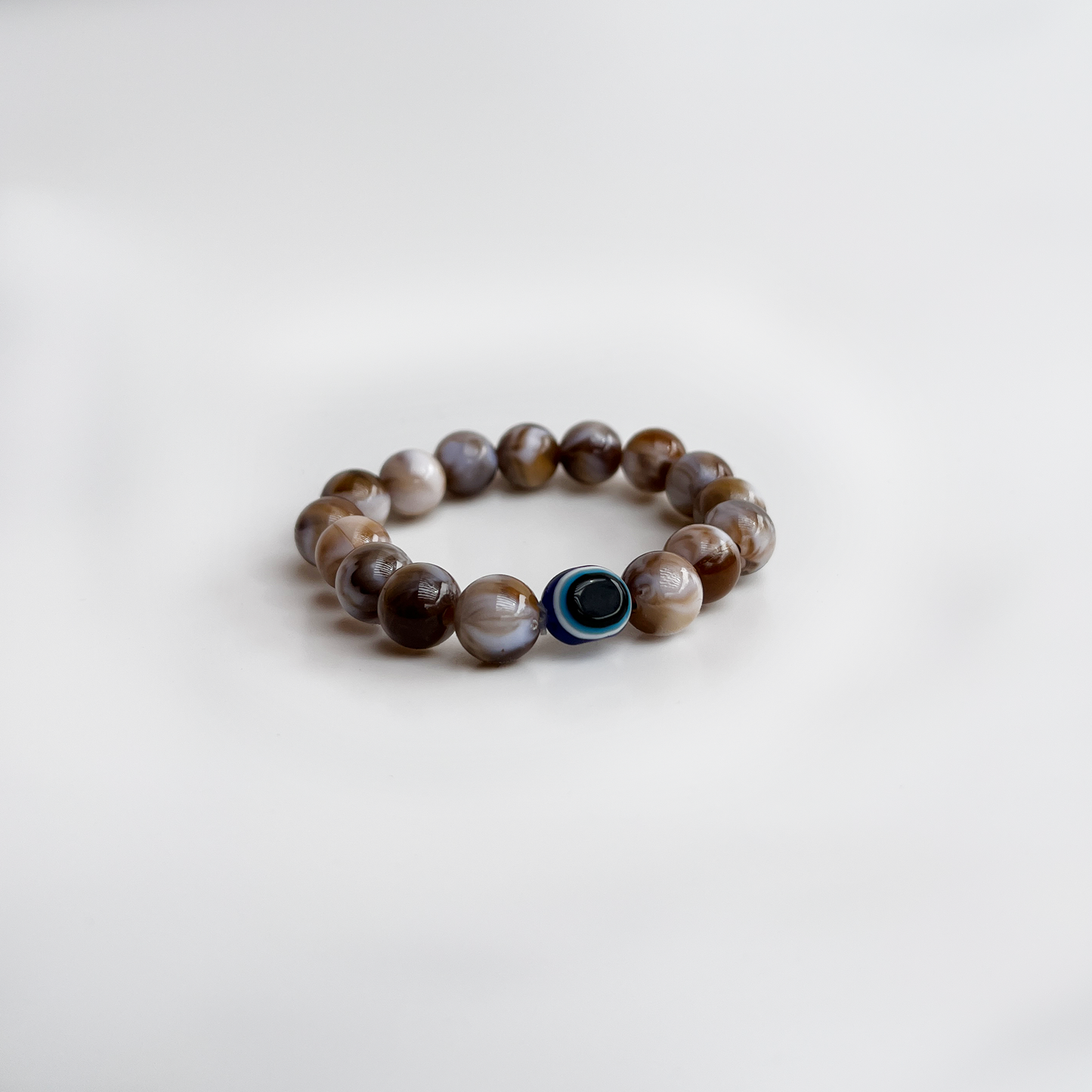 The Biscuit Evil Eye Bracelet